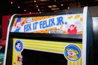 'Fix It Felix Jr' game within repoduction Nintendo cabinet, inspired by Wreck It Ralph - 4