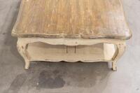 COFFEE TABLE: A rustic styled low coffee table, with cabriole style legs and carved detailing to the apron, measures 140cm wide, 91cm deep, 46cm high - 6