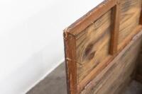 TIMBER BOX: A circa 1940s/1950s fireplace timber box with embossed copper front with log cabin scene, grape detailed handles, upholstered top, measures 53cm high, 75cm wide, 39cm deep - 5