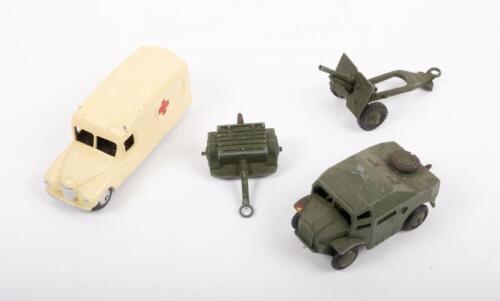 DINKY TOYS: Four Military Dinky Toys model, including No.253 Daimler ambulance, No.688 Field Artillery Tractor, No.696 25PRGUN, and a trailer