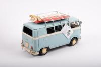 VOLKSWAGEN: A modern tin toy Volkswagen Kombi with surfboards the roof rack, approximately 31cm long - 2