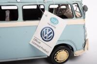 VOLKSWAGEN: A modern tin toy Volkswagen Kombi with surfboards the roof rack, approximately 31cm long - 3