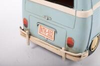 VOLKSWAGEN: A modern tin toy Volkswagen Kombi with surfboards the roof rack, approximately 31cm long - 4