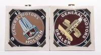GMH: Two modern new in box General Motors Holden tin wall mountable clocks