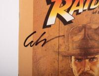 RAIDERS OF THE LOST ARK: A 1981 Raiders of the Lost Ark collectors' album booklet as signed to cover by Harrison Ford, George Lucas, and Lawrence Kasdan with accompanying purchase receipt from Ebay. - 4