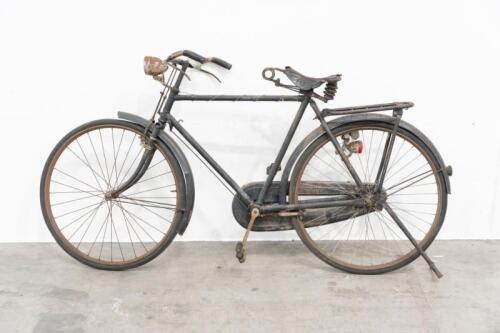 170C · RALEIGH: An early, likely pre-war 28-inch Raleigh bicycle, fitted with a large leather spring seat