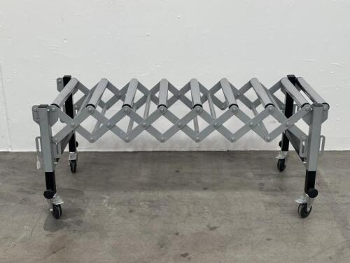 ROLLER TABLE: An adjustable, expandable roller conveyor style table on wheels, 60cm wide in folded position, approx 145cm fully extended