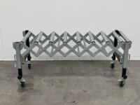 ROLLER TABLE: An&nbsp;adjustable,&nbsp;expandable roller conveyor style table on wheels, 60cm wide in folded position, approx 145cm fully extended