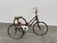 TRIKE: A c1960s-1970s children's trike in red with white guard and pinstriping details, measures approx 74cm high, 105cm long