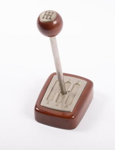 150A · DESK PIECE: A nice automotive related desk piece in the form of a gear stick unit, with the gear stick removable as a pen 16.5cm high