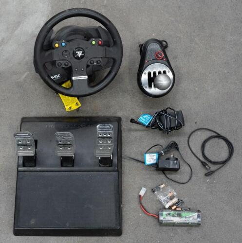 THRUSTMASTER: A Thrustmaster driving simulator set comprising of pedals, a table mount steering wheel, and a gear shifter