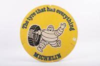 MICHELIN: A double sided round Michelin cardboard advertising sign featuring waving Bibendum&nbsp;to either side 'The tyre that has everything - Michelin' 36cm in diameter&nbsp; - 4