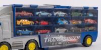 TOY CARS: A large group of toy cars, including a transporter containing various vehicles,&nbsp;along with a small carry case and sections of track pieces. Toy vehicles from brands such as Hot Wheels & Matchbox - 3