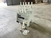 OIL BOTTLE RACK: A reproduction Shell Super SF motor oil rack with a collection of 6 one-litre and 3 500ml bottles, along with Valvoline branded plastic tops and caps [Location: Sydney] - 5