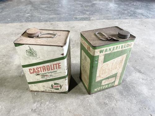 OIL CANS: A pair of Castrol one gallon oil cans, in original used condition [Location: Sydney]