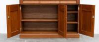 BOOK CASE: A two tiered timber bookcase by Pfitzner Furniture South Australia, featuring glazed display cabinetry, with a drawer and storage space to the lower, 137cm wide, 207cm high, 47cm deep - 3