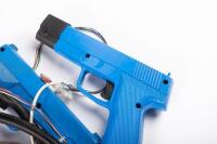 Happ Colt 75 universal guns, blue and red, box labelled 'untested' [Location: Dingley Village] - 2