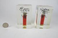 BOOKENDS: A pair of decorative 'discharged shotgun' book ends