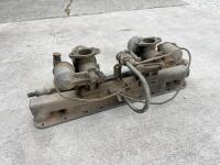 JAGUAR: A Jaguar Mark II inlet manifold with water rail and carburettors. [Location: Sydney] - 7