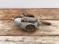 TROJAN: A Trojan engine, stamped 'EX 104320 W'