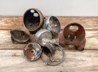 HEADLIGHT PARTS: A group of assorted headlight parts
