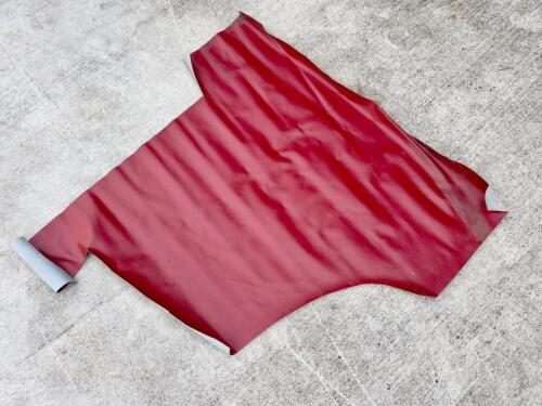 JAGUAR: A small quantity of red interior vinyl, believed to suit Jaguar. [Location: Sydney]