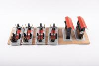 A group of Wilesco&nbsp;items, including four Wilesco M-58 Black Smith Hammer models and two M-61 Forge shop models mounted to a timber base