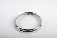 TRIUMPH: A NOS Triumph 'Nacelle' Lucas MF42 headlight chrome mounting rim