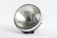 LUCAS: A&nbsp;side bolt mount Lucas seven inch headlight complete with an original Lucas switch plate