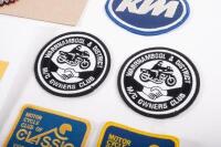 PATCHES: A group of assorted motorcycle related cloth patches and award ribbons - 2