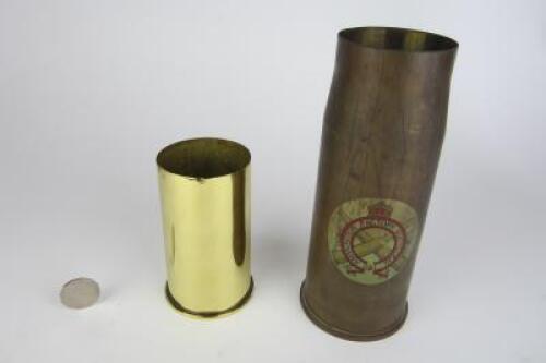 MILITARY: Two large shell casings