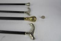 WALKING STICKS: Four contemporary gentleman's walking sticks of various traditional style