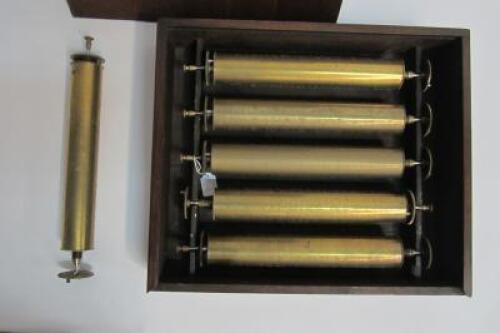 MUSICAL BOX: Six antique brass musical box cylinders