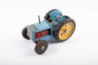 BOOMAROO: A c1950s tinplate farm tractor by Boomaroo, Australian, 26cm long