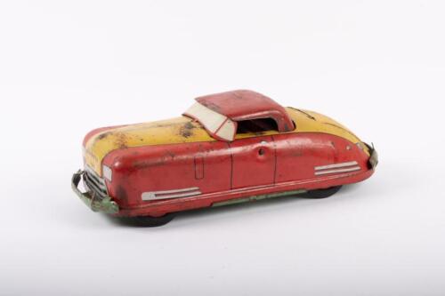 WYANDOTTE: A rare c1940s Wyandotte Toys USA No.651 Sportsman Convertible pressed tin wind up toy, 32cm long