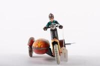 MOTORCYCLE: A c1950s USSR made wind up tin toy motorcycle with side car, 22cm long - 2