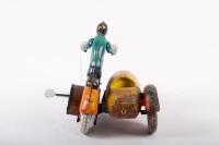 MOTORCYCLE: A c1950s USSR made wind up tin toy motorcycle with side car, 22cm long - 6