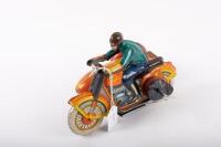 MOTORCYCLE: A c1950s USSR made wind up tin toy motorcycle with side car, 22cm long - 10