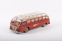 BUS: A c1950s tin plate model bus, with clear plastic roof, opening featuring opening hatch, marked 'Made in Western Germany', 30cm long