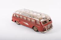 BUS: A c1950s tin plate model bus, with clear plastic roof, opening featuring opening hatch, marked 'Made in Western Germany', 30cm long - 5