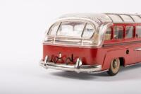 BUS: A c1950s tin plate model bus, with clear plastic roof, opening featuring opening hatch, marked 'Made in Western Germany', 30cm long - 8