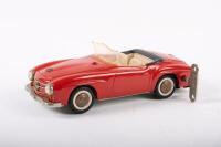 SHUCO: A late 1950s- early 1960s Shuco No.2097 Mercedes-Benz 190SL in red, wind up complete with key, made in Western Germany, 22cm long