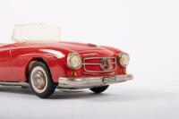 SHUCO: A late 1950s- early 1960s Shuco No.2097 Mercedes-Benz 190SL in red, wind up complete with key, made in Western Germany, 22cm long - 5
