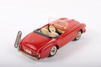 SHUCO: A late 1950s- early 1960s Shuco No.2097 Mercedes-Benz 190SL in red, wind up complete with key, made in Western Germany, 22cm long - 6