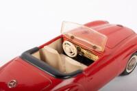 SHUCO: A late 1950s- early 1960s Shuco No.2097 Mercedes-Benz 190SL in red, wind up complete with key, made in Western Germany, 22cm long - 7