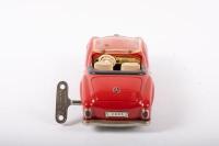 SHUCO: A late 1950s- early 1960s Shuco No.2097 Mercedes-Benz 190SL in red, wind up complete with key, made in Western Germany, 22cm long - 8