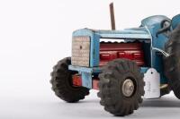 BOOMAROO: A c1950s tinplate farm tractor by Boomaroo, Australian, 26cm long - 5