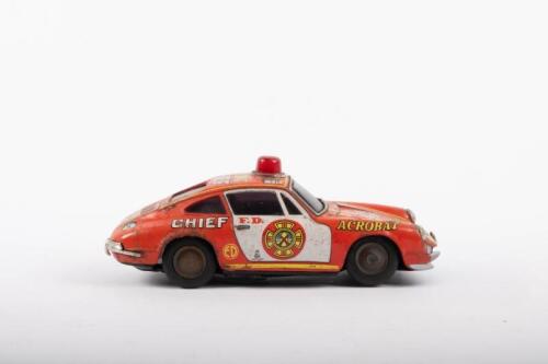 TIN TOY: A circa 1960s Toplay Ltd. (TPS), made in Japan, Porsche 911 Fire Chief battery operated tin toy vehicle