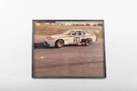 COLIN BOND: A signed and inscribed photo of Colin Bond dated 1982 driving a Porsche 944 Turbo in the Australian GT Championship, inscribed to Alan from Colin