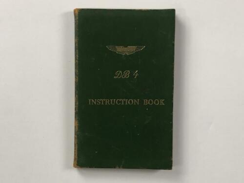 ASTON MARTIN DB-4: An original green leather bound Aston Martin DB-4 Instruction Book